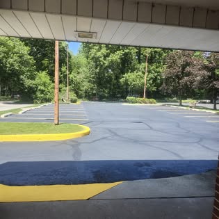 Evenly sealcoated parking surface